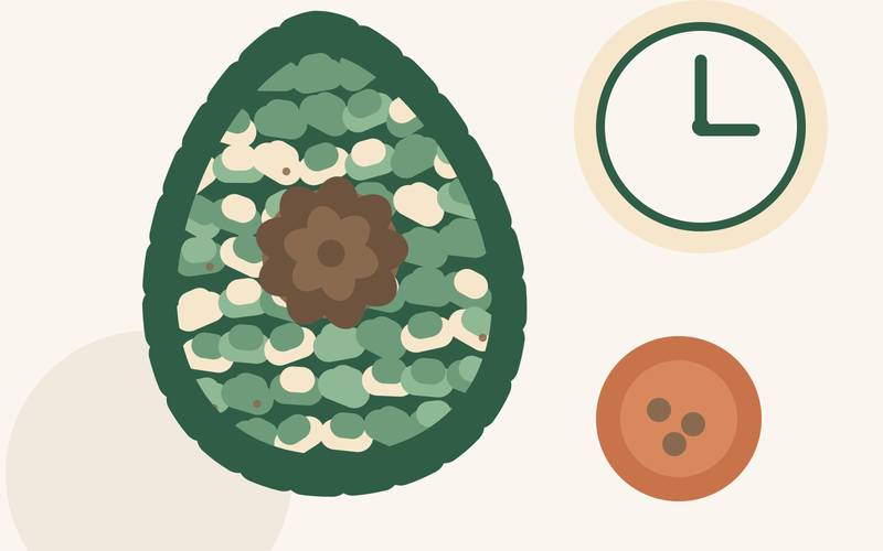 An avocado-shaped snuffle mat next to a clock face and a portion of dry food