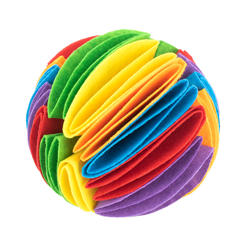 The rainbow snuffle ball: layered felt petals in red, orange, yellow, green, blue and purple, on a white background.
