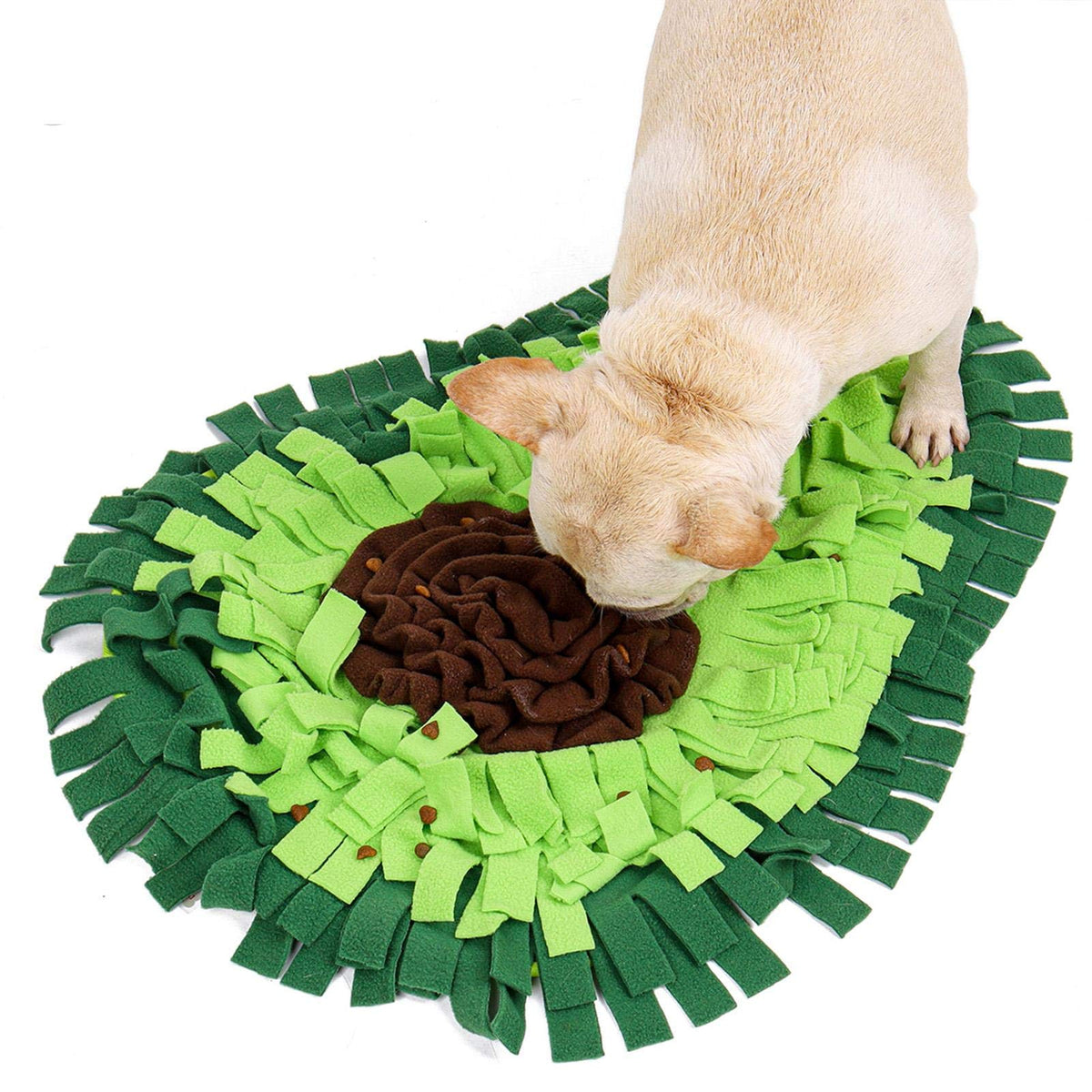 A dog nosing kibble out of the green avocado snuffle mat, seen from the side.